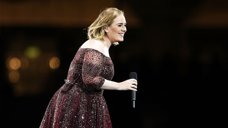 Adele singing on stage