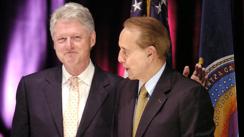 Former President Bill Clinton with former Senator Bob Dole as Dole introduces him at the first Dole Lecture in Lawrence KS 2004