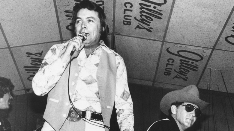 Mickey Gilley performs with his cousin Jerry Lee Lewis at Gilley's Club in Pasadena, Texas 1975