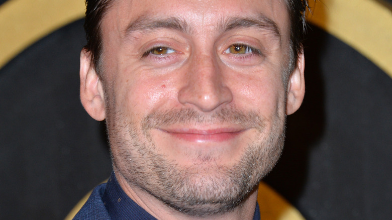 Kieran Culkin smiles on red carpet