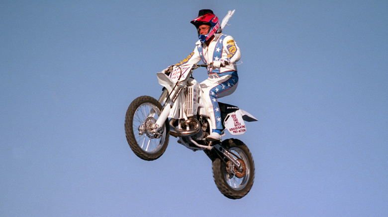 Robbie Knievel jumping through the air