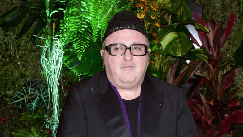 Alber Elbaz outside wearing hat