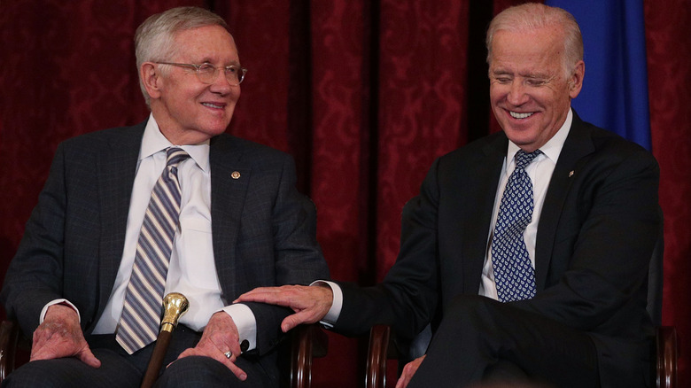 Harry Reid and Joe Biden laughing 