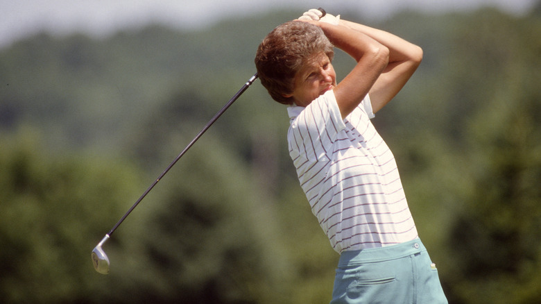 Kathy Whitworth playing golf