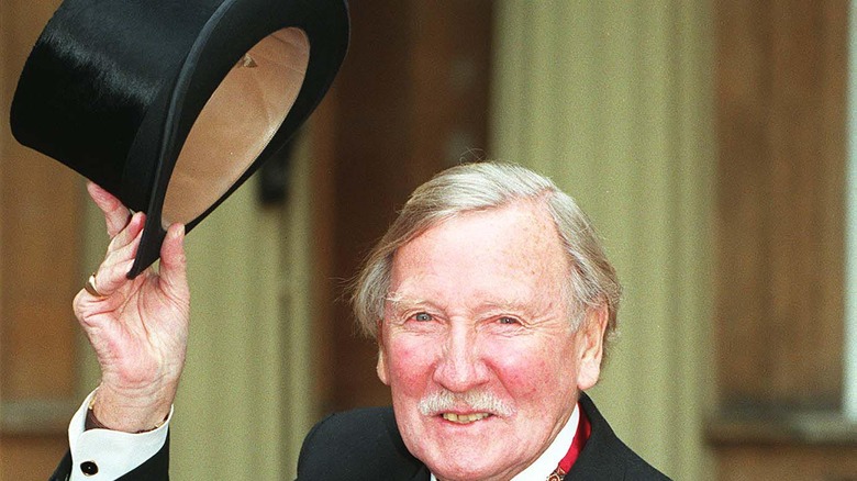 Leslie Phillips with a top hat