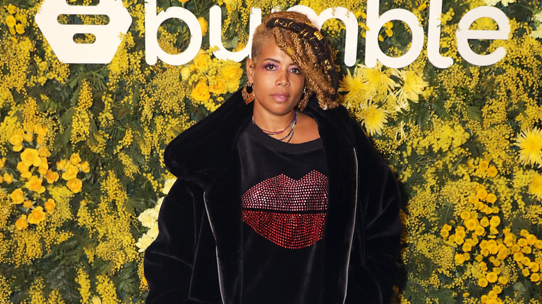 Kelis posing with lips on shirt