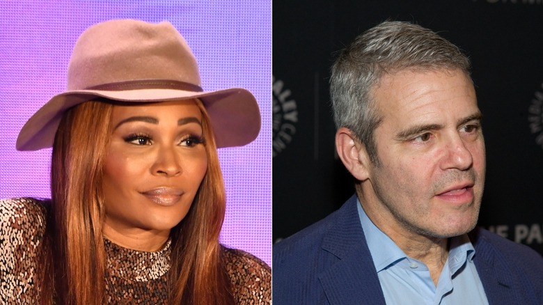 Cynthia Bailey and Andy Cohen with serious expressions