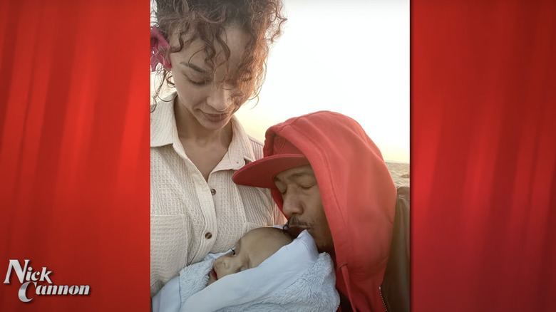 Alyssa Scott with Nick Cannon and their baby Zen