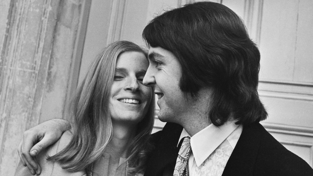 Linda McCartney smiling with John McCartney