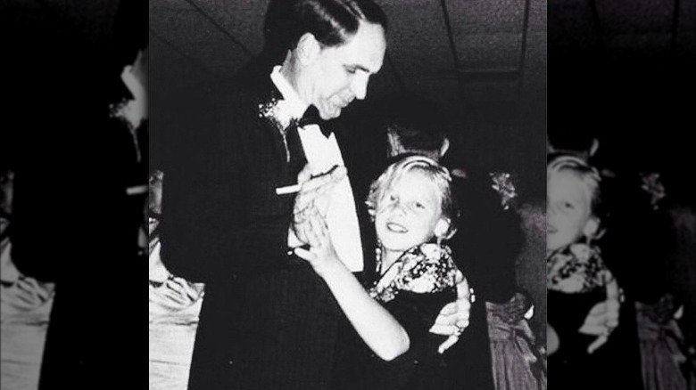 Pink dancing with dad as a child