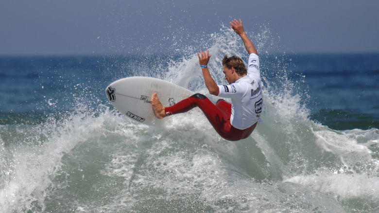 Chris Davidson surfing