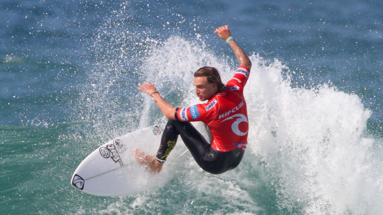 Chris Davidson surfing