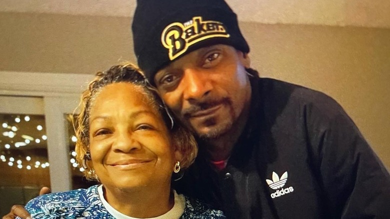 Snoop Dogg and Beverly Tate smiling