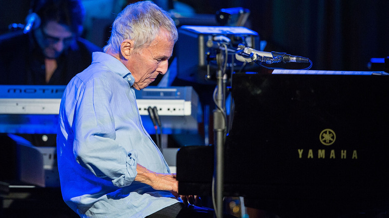 Burt Bacharach playing the piano