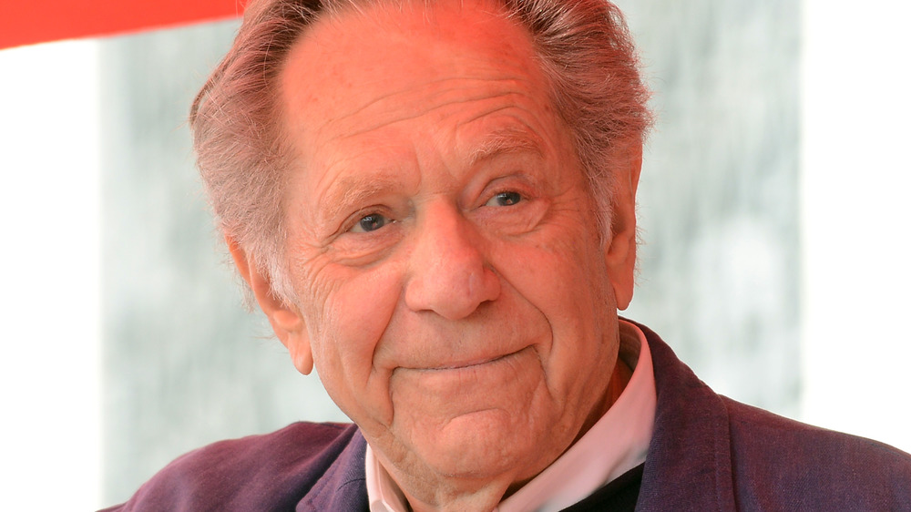 George Segal poses at an event