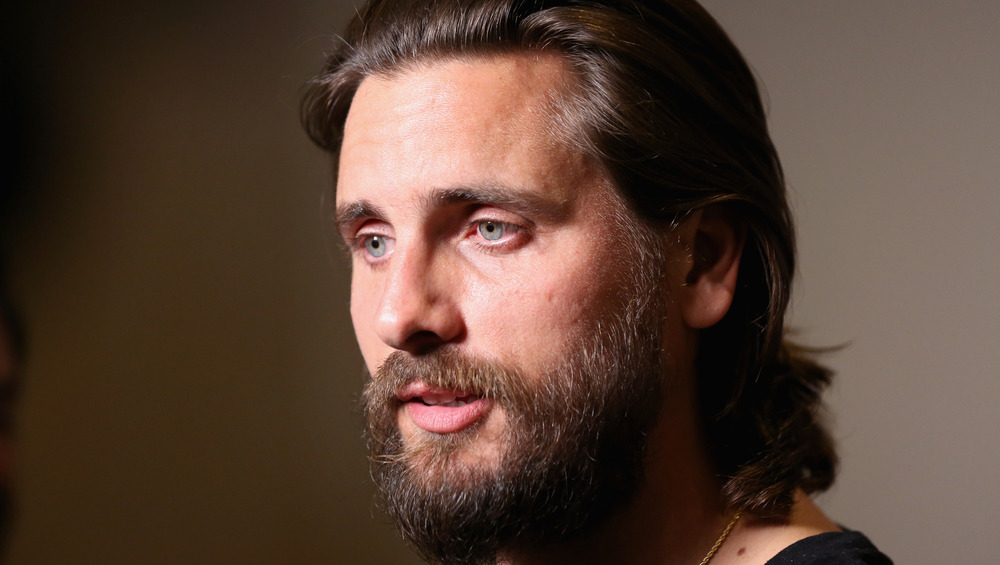 Scott Disick with long hair and a beard