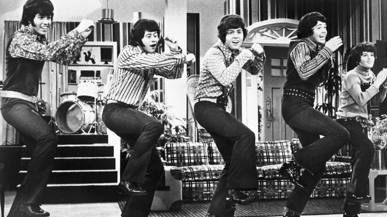 The Osmonds performing in black and white