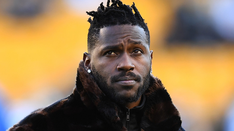 Antonio Brown wearing a fur coat