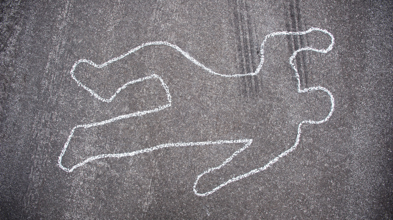 chalk body outline on pavement