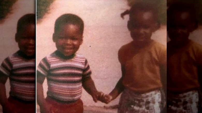 A young 50 Cent playing with a friend 