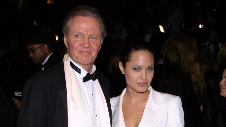 Angelina Jolie and her father Jon Voight both posing