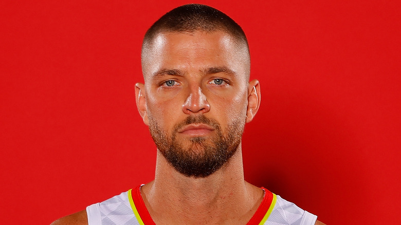 Chandler Parsons posing with basketball