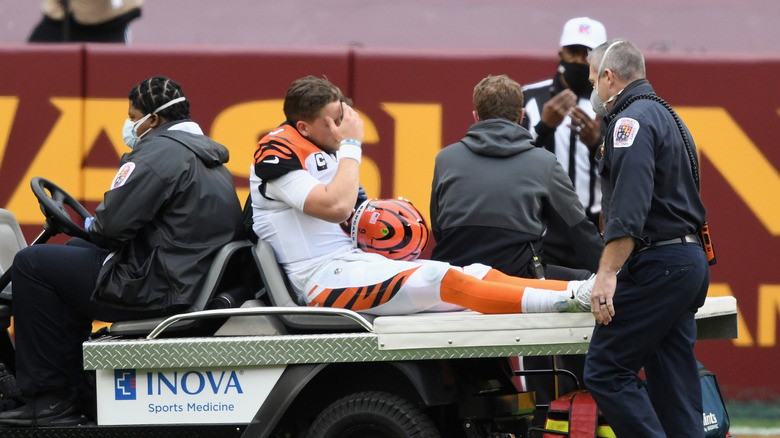 Joe Burrow getting carted off the field