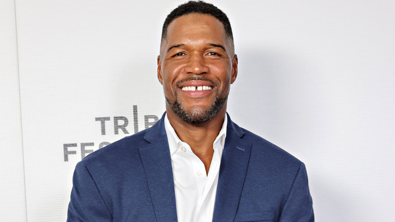 Michael Strahan smiling on red carpet