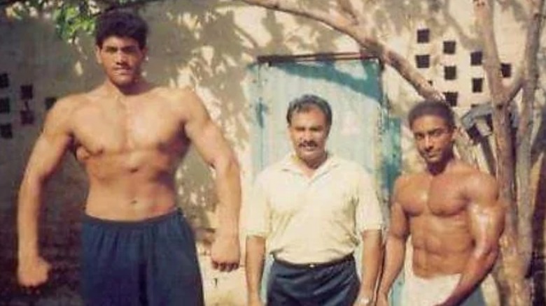 The Great Khali showing off his muscles