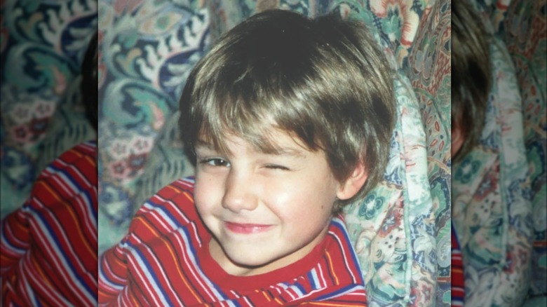 Young Liam Payne winks at the camera