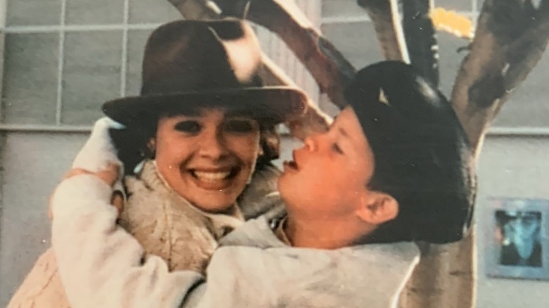 Lauren Holly hugging brother Alexander