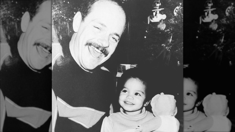 Vanessa Hudgens and her dad smiling