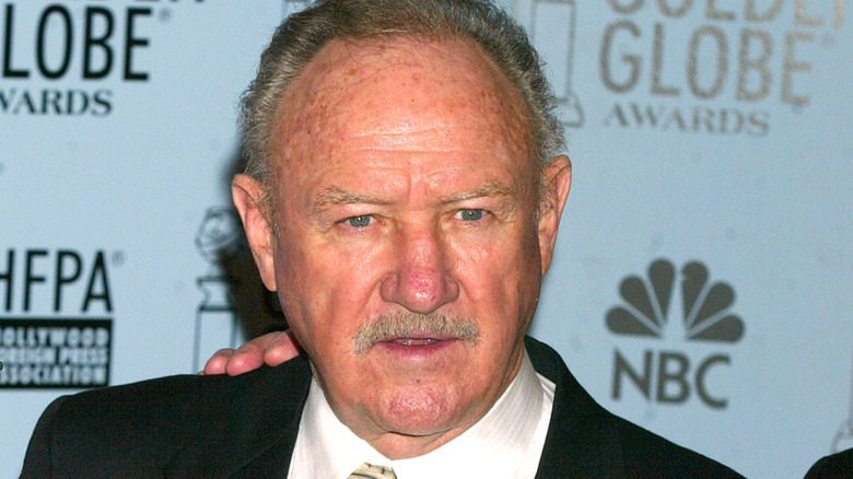 Gene Hackman, posing at an event