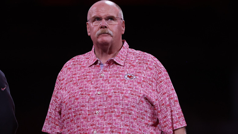 Andy Reid looking serious on stage