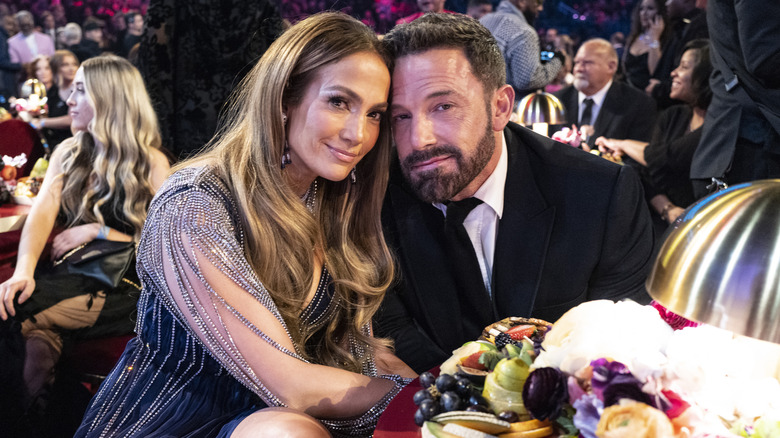 Jennifer Lopez and Ben Affleck touching heads at the Grammys