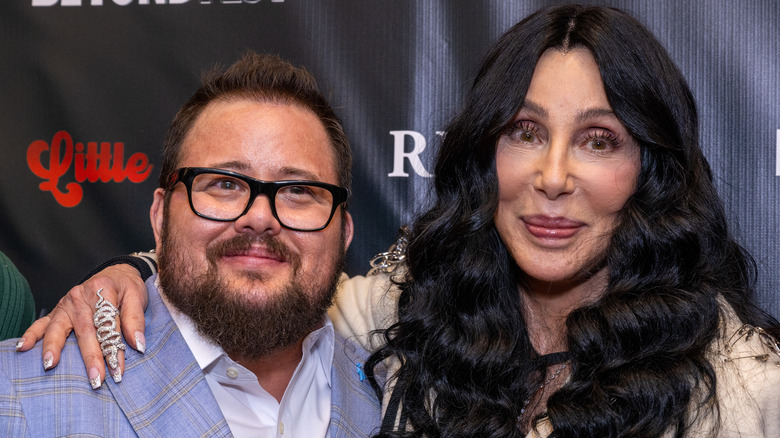 Chaz Bono, posing with Cher