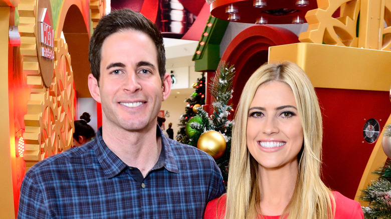 Tarek and Christina El Moussa posing on Christmas