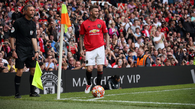 David Beckham playing soccer