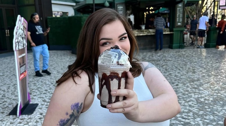 Bonnie Chapman poses with a chocolate drink