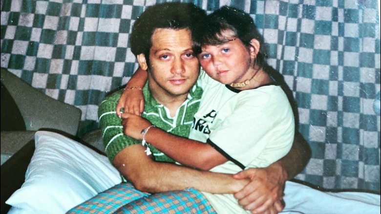 Rob Schneider holding daughter Elle King