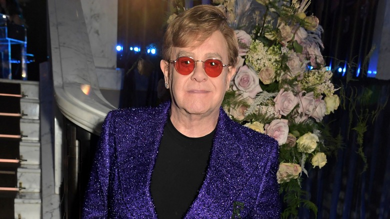 Elton John posing