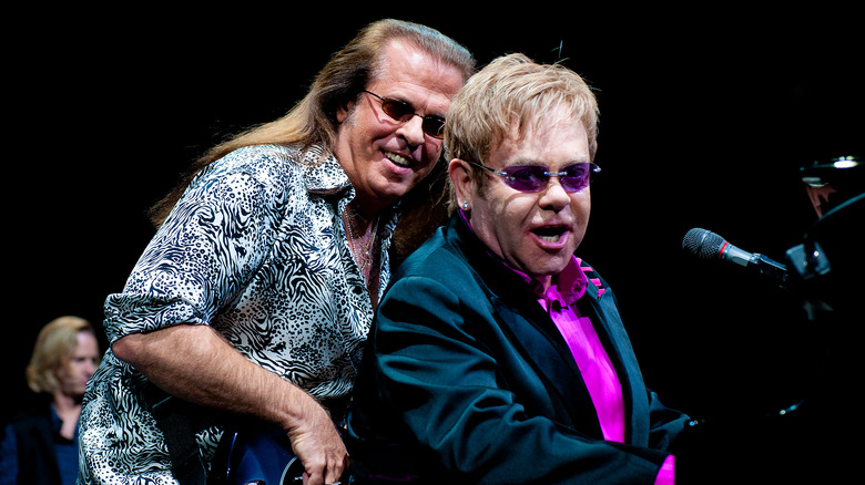 Elton John on stage with Bob Birch