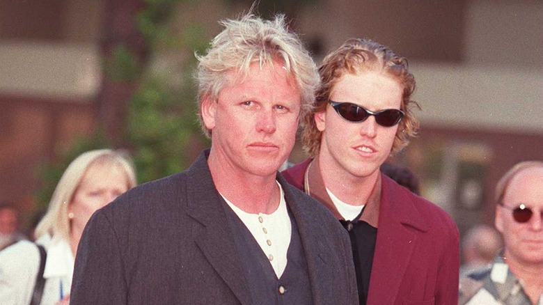 Gary Busey walking with Jake Busey