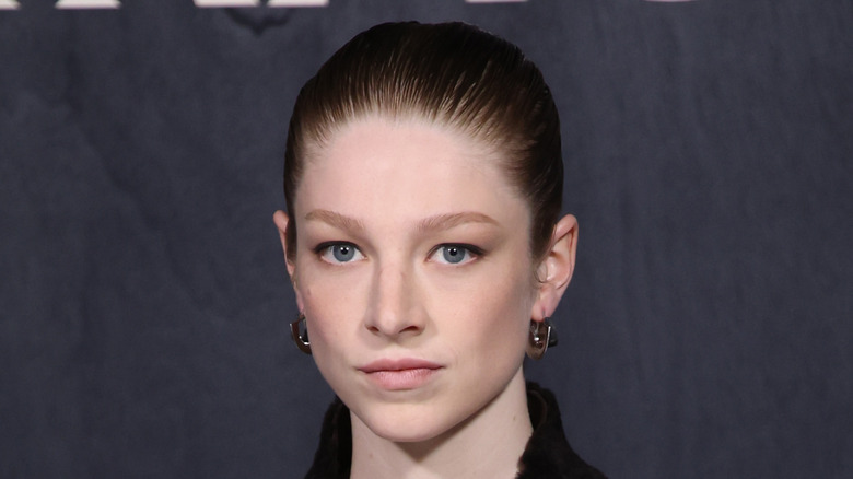 Hunter Schafer with slicked back bun