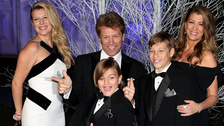 Jon Bon Jovi and Dorothea Hurley pose with Stephanie and two sons in 2013