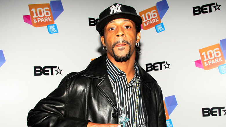 Katt Williams licking his lips at red carpet event