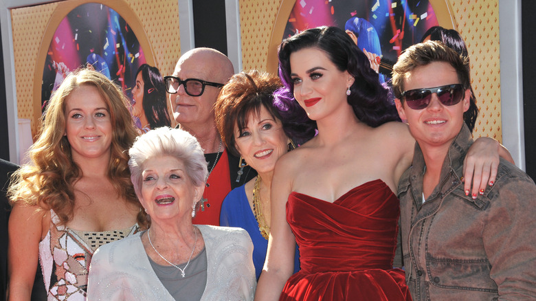 Katy Perry poses with her family at the 'Part of Me' documentary