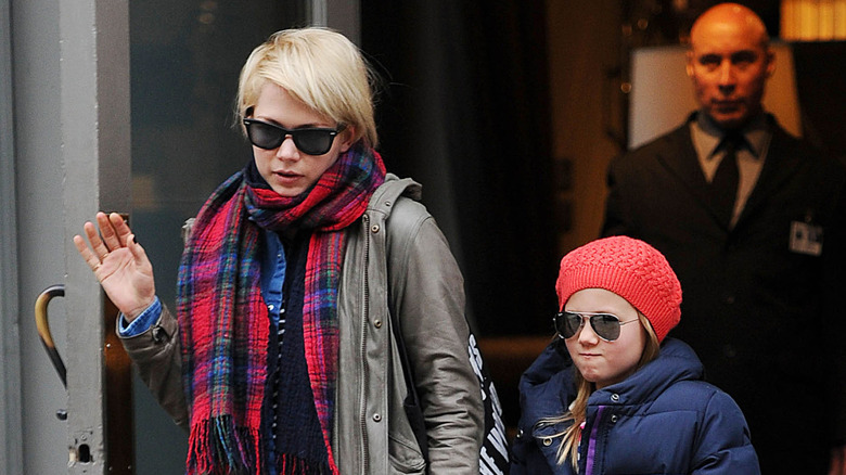 Michelle Williams and Matilda Ledger walking