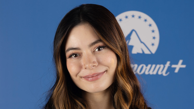 Miranda Cosgrove slightly smiling