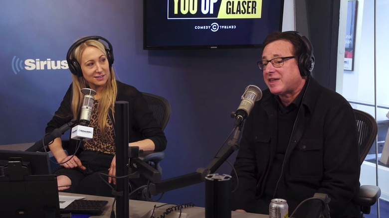 Nikki Glaser looking at Bob Saget